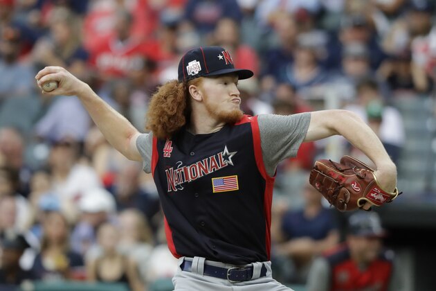 Dustin May, of the Los Angeles Dodgers, throws during the MLB All-Star Futures baseball game, Sunday, July 7, 2019, in Cleveland. The 90th MLB baseball All-Star Game will be played Tuesday. (AP Photo/Darron Cummings)