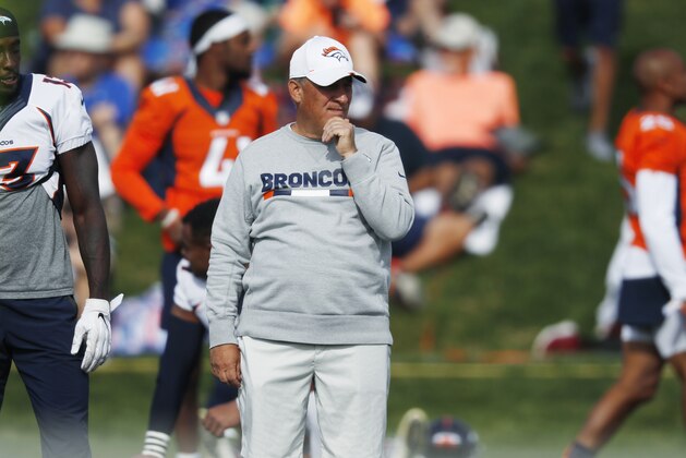 Denver Broncos head coach Vic Fangio looks on as players take part in an NFL football training camp practice at the team's headquarters Tuesday, July 30, 2019, in Englewood, Colo. (AP Photo/David Zalubowski)