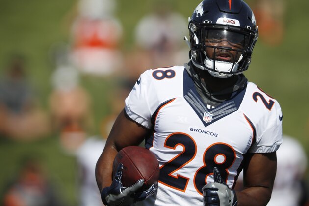 Denver Broncos running back Royce Freeman takes part in drills during the opening day of the team's NFL football training camp Thursday, July 18, 2019, in Englewood, Colo. (AP Photo/David Zalubowski)
