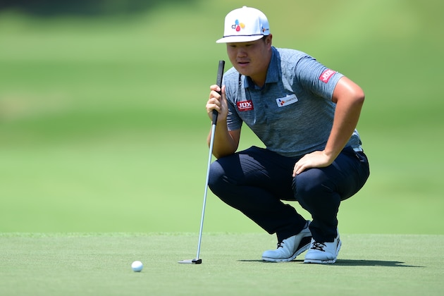 GREENSBORO, NORTH CAROLINA - AUGUST 01: Sungjae Im of South Korea reads the tenth green during the first round of the Wyndham Championship at Sedgefield Country Club on August 01, 2019 in Greensboro, North Carolina. (Photo by Jared C. Tilton/Getty Images)