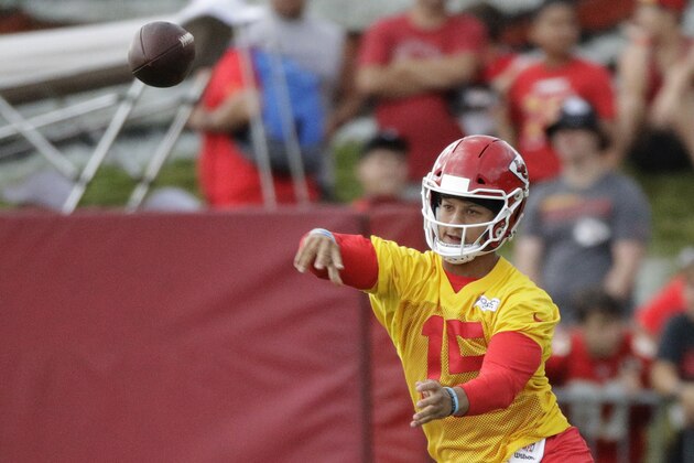Kansas City Chiefs quarterback Patrick Mahomes throws the ball during NFL football training camp Wednesday, July 31, 2019, in St. Joseph, Mo. (AP Photo/Charlie Riedel)