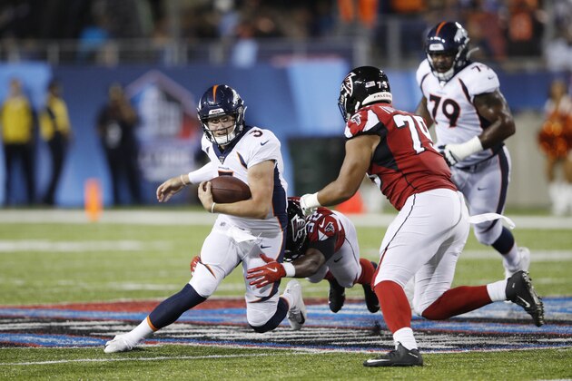 CANTON, OH - AUGUST 01: Drew Lock #3 of the Denver Broncos tries to avoid pressure in the first half of a preseason game against the Atlanta Falcons at Tom Benson Hall Of Fame Stadium on August 1, 2019 in Canton, Ohio. (Photo by Joe Robbins/Getty Images)