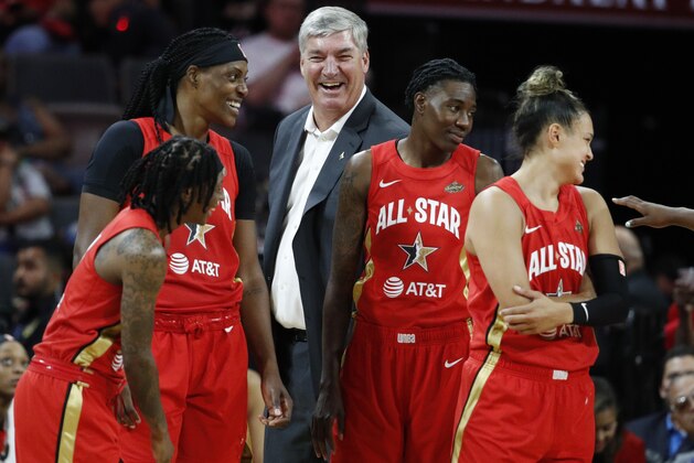Team Wilson head coach Bill Laimbeer, center, laughs with his team during the second half of a WNBA All-Star basketball game against Team Delle Donne, Saturday, July 27, 2019, in Las Vegas. (AP Photo/John Locher)
