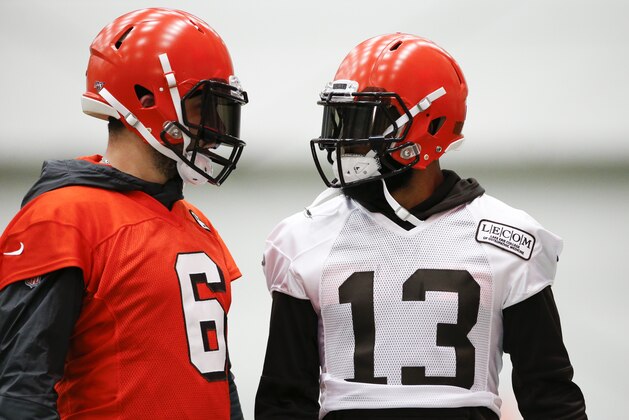 Cleveland Browns quarterback Baker Mayfield (6) talks with Odell Beckham Jr (13) during practice at the team's NFL football training facility in Berea, Ohio, Thursday, June 6, 2019. (AP Photo/Ron Schwane)