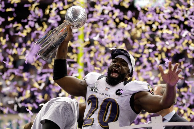 NEW ORLEANS, LA - FEBRUARY 03:  Ed Reed #20 of the Baltimore Ravens celebrates with the VInce Lombardi trophy after the Ravens won 34-31 against the San Francisco 49ers during Super Bowl XLVII at the Mercedes-Benz Superdome on February 3, 2013 in New Orleans, Louisiana.  (Photo by Ezra Shaw/Getty Images)