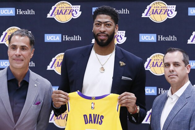 EL SEGUNDO, CA - JULY 13: General Manager Rob Pelinka and Head Coach, Frank Vogel introduce Anthony Davis #3 of the Los Angeles Lakers to the media during a press conference on July 13, 2019 at the UCLA Health Training Center in El Segundo, California. NOTE TO USER: User expressly acknowledges and agrees that, by downloading and/or using this photograph, user is consenting to the terms and conditions of the Getty Images License Agreement. Mandatory Copyright Notice: Copyright 2019 NBAE (Photo by Chris Elise/NBAE via Getty Images)