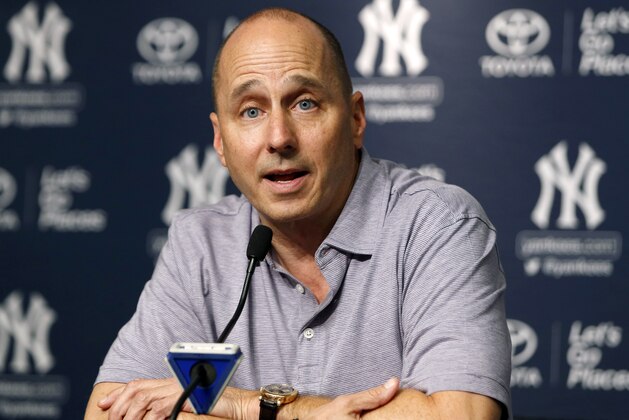 FILE - In this July 31, 2017, file photo, New York Yankees general manager Brian Cashman speaks during a news conference in New York. Cashman wants to bring CC Sabathia back for an 11th season with the Yankees and also hopes to re-sign J.A. Happ but sounds less confident. (AP Photo/Kathy Willens, File)