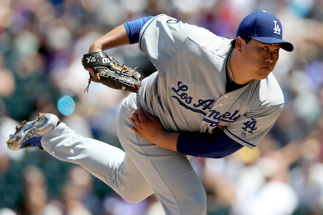 DENVER, COLORADO - JULY 31: Starting pitcher Hyun-Jin Ryu #99 of the Los Angeles Dodgers throws in the first inning against the Colorado Rockies at Coors Field on July 31, 2019 in Denver, Colorado. (Photo by Matthew Stockman/Getty Images)