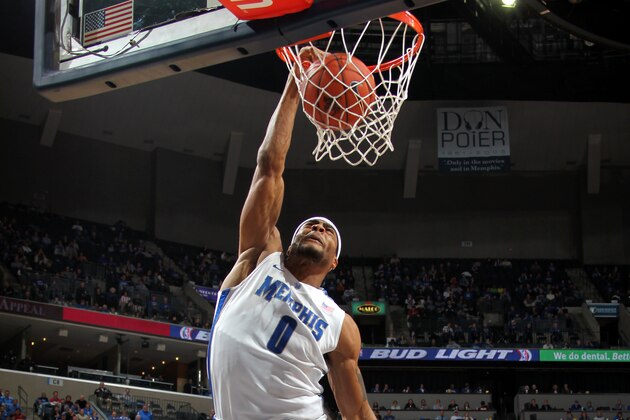 MEMPHIS, TN - JANUARY 26: Will Coleman #0 of the Memphis Tigers dunks the ball over David Diakite #15 of the UCF Knights on January 26, 2011 at FedExForum in Memphis, Tennessee. Memphis beat Central Florida 77-61.  (Photo by Joe Murphy/Getty Images)