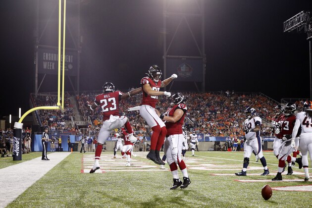 CANTON, OH - AUGUST 01: Brian Hill #23 of the Atlanta Falcons celebrates after a one-yard touchdown reception in the second quarter of a preseason game against the Denver Broncos at Tom Benson Hall Of Fame Stadium on August 1, 2019 in Canton, Ohio. (Photo by Joe Robbins/Getty Images)