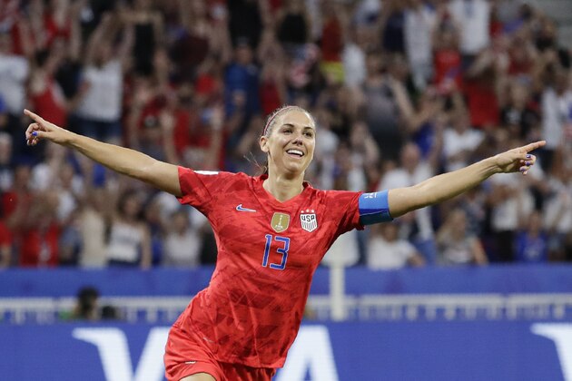 United States' Alex Morgan celebrates after scoring her side's second goal during the Women's World Cup semifinal soccer match between England and the United States, at the Stade de Lyon, outside Lyon, France, Tuesday, July 2, 2019. (AP Photo/Alessandra Tarantino)
