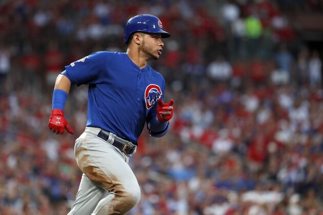 Chicago Cubs' Willson Contreras rounds first on a single during the third inning of the team's baseball game against the St. Louis Cardinals on Wednesday, July 31, 2019, in St. Louis. Contreras was tagged out at second trying to stretch the single into a double. (AP Photo/Jeff Roberson)
