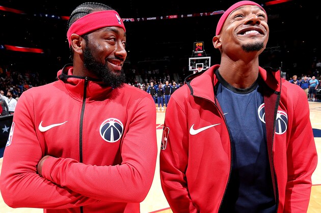 WASHINGTON, DC - OCTOBER 1: John Wall #2, and Bradley Beal #3 of the Washington Wizards are seen during the National Anthem before the game against the New York Knicks on October 1, 2018 at Capital One Arena in Washington, DC. NOTE TO USER: User expressly acknowledges and agrees that, by downloading and/or using this photograph, user is consenting to the terms and conditions of the Getty Images License Agreement. Mandatory Copyright Notice: Copyright 2018 NBAE (Photo by Ned Dishman/NBAE via Getty Images)