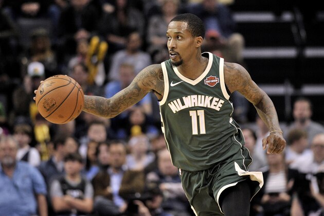 Milwaukee Bucks guard Brandon Jennings (11) brings the ball upcourt in the first half of an NBA basketball game against the Memphis Grizzlies, Monday, March 12, 2018, in Memphis, Tenn. (AP Photo/Brandon Dill)