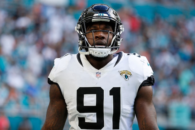 MIAMI, FL - DECEMBER 23:  Yannick Ngakoue #91 of the Jacksonville Jaguars looks on against the Miami Dolphins at Hard Rock Stadium on December 23, 2018 in Miami, Florida.  (Photo by Michael Reaves/Getty Images)