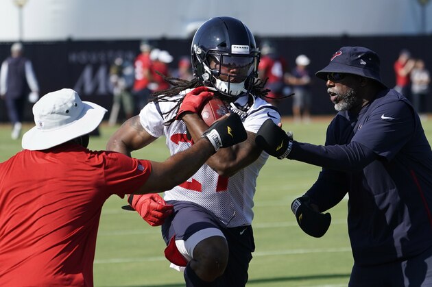 Houston Texans running back D'Onta Foreman (27) runs a drill during an NFL football training camp practice Thursday, July 25, 2019, in Houston. (AP Photo/David J. Phillip)