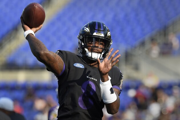 Baltimore Ravens quarterback Lamar Jackson throws a pass during NFL football training camp Saturday, July 27, 2019, in Baltimore. (AP Photo/Gail Burton)