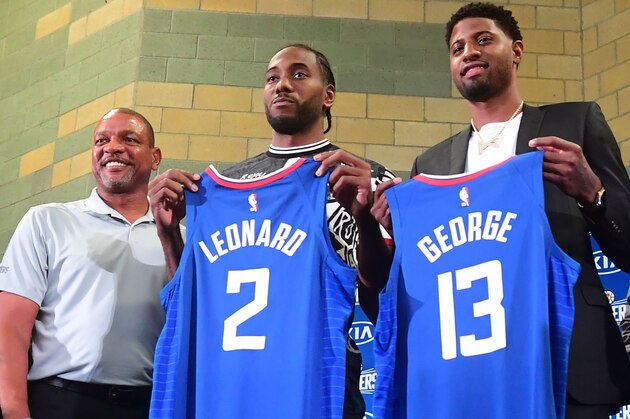 (FromR) Clippers owner Steve Ballmer, US basketball players Paul George and Kawhi Leonard, Clippers coach Doc Rivers and Clippers President of Basketball Operations Lawrence Frank pose during the introduction of Leonard and George as the new players of the Los Angeles Clippers during a press conference in Los Angeles on July 24, 2019. (Photo by Frederic J. BROWN / AFP)        (Photo credit should read FREDERIC J. BROWN/AFP/Getty Images)