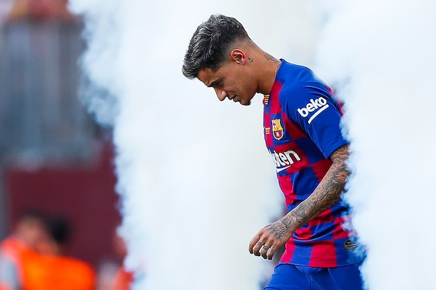 BARCELONA, SPAIN - AUGUST 04: Philippe Coutinho of FC Barcelona waves to supporters ahead of the match between FC Barcelona and Arsenal at Nou Camp on August 04, 2019 in Barcelona, Spain. (Photo by Eric Alonso/MB Media/Getty Images)