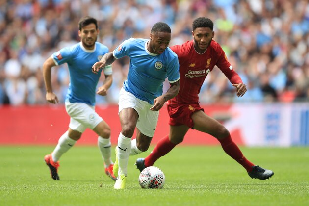 LONDON, ENGLAND - AUGUST 04: Raheem Sterling and David Silva of Manchester City in action with Joe Gomez of Liverpool during the FA Community Shield match between Liverpool and Manchester City at Wembley Stadium on August 4, 2019 in London, England. (Photo by Marc Atkins/Getty Images)