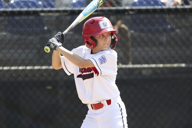 Washington D.C.'s Henry Evans bats during a Little League regional tournament baseball game against New Jersey, Monday, Aug. 5, 2019, in Bristol, Conn. (AP Photo/Steve Luciano)