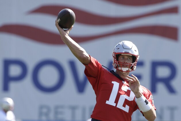 New England Patriots quarterback Tom Brady (12) passes the ball during an NFL football training camp practice, Thursday, July 25, 2019, in Foxborough, Mass. (AP Photo/Steven Senne)