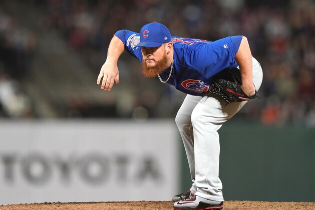 SAN FRANCISCO, CA - JULY 23:  Craig Kimbrel #24 of the Chicago Cubs pitches against the San Francisco Giants in the bottom of the 11th inning at Oracle Park on July 23, 2019 in San Francisco, California.  (Photo by Thearon W. Henderson/Getty Images)