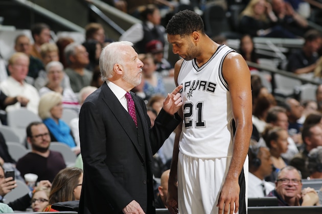 SAN ANTONIO, TX - DECEMBER 2:  Head coach Gregg Popovich of the San Antonio Spurs and Tim Duncan #21 of the San Antonio Spurs talk during the game against the Milwaukee Bucks on December 2, 2015 at the AT&T Center in San Antonio, Texas. NOTE TO USER: User expressly acknowledges and agrees that, by downloading and or using this photograph, user is consenting to the terms and conditions of the Getty Images License Agreement. Mandatory Copyright Notice: Copyright 2015 NBAE (Photos by Chris Covatta/NBAE via Getty Images)