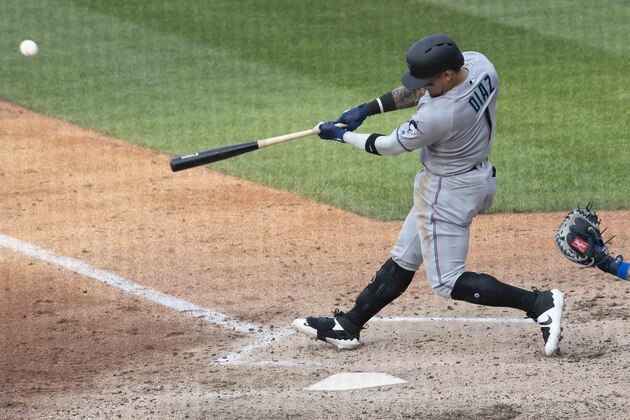 Miami Marlins' Isan Diaz hits a home run in his major league debut during the sixth inning of a baseball game against the New York Mets, Monday, Aug. 5, 2019, in New York. (AP Photo/Mary Altaffer)