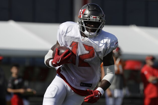 Tampa Bay Buccaneers wide receiver Chris Godwin (12) during an NFL football training camp practice Sunday, July 28, 2019, in Tampa, Fla. (AP Photo/Chris O'Meara)