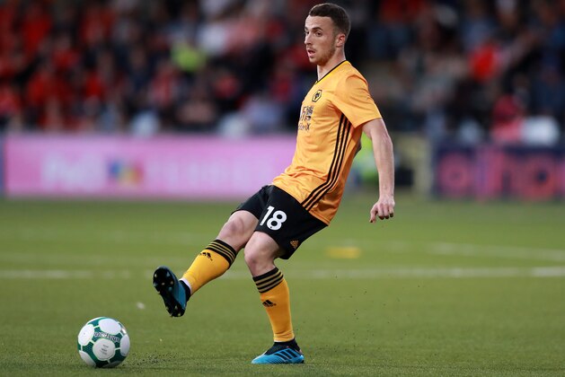 BELFAST, NORTHERN IRELAND - AUGUST 01:  Diogo Jota of Wolverhampton Wanderers passes the ball during the UEFA Europa League Second Qualifying round 2nd Leg match between Crusaders and Wolverhampton Wanderers at Seaview Stadium on August 01, 2019 in Belfast, Northern Ireland. (Photo by David Rogers/Getty Images)