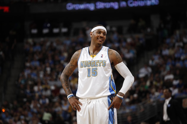 Denver Nuggets forward Carmelo Anthony looks on against the Utah Jazz in the third quarter of the Nuggets' 116-102 victory in Game 6 of the teams' NBA basketball first-round Western Conference playoff series on Wednesday, April 28, 2010, in Denver. (AP Photo/David Zalubowski)