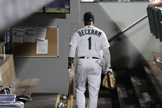 Seattle Mariners shortstop Tim Beckham walks alone through the dugout after the Los Angeles Angels beat the Mariners 9-3 in a baseball game, Thursday, May 30, 2019, in Seattle. (AP Photo/Ted S. Warren)