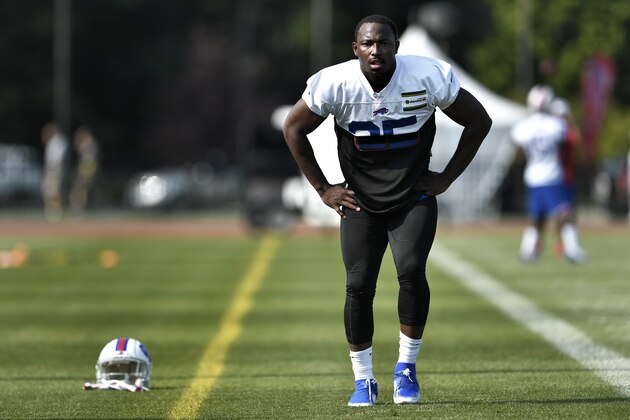 Buffalo Bills running back LeSean McCoy stretches during practice at the NFL football team's training camp in Pittsford, N.Y., Thursday, July 25, 2019. (AP Photo/Adrian Kraus)