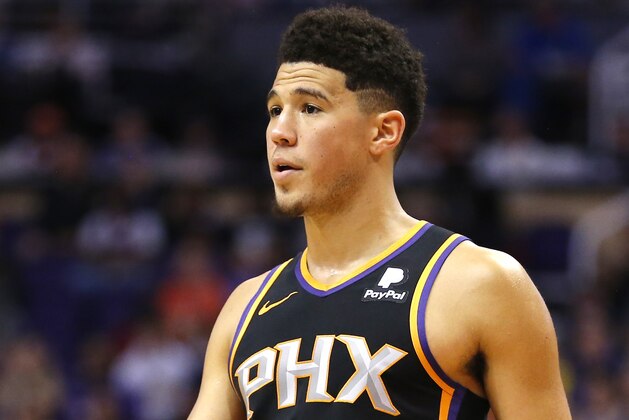 Phoenix Suns guard Devin Booker (1) in the first half during an NBA basketball game against the Los Angeles Lakers, Saturday, March 2, 2019, in Phoenix. (AP Photo/Rick Scuteri)