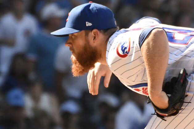 Chicago Cubs relief pitcher Craig Kimbrel (24) throws the ball against the Milwaukee Brewers during the ninth inning of a baseball game, Saturday, Aug. 3, 2019, in Chicago. (AP Photo/David Banks)