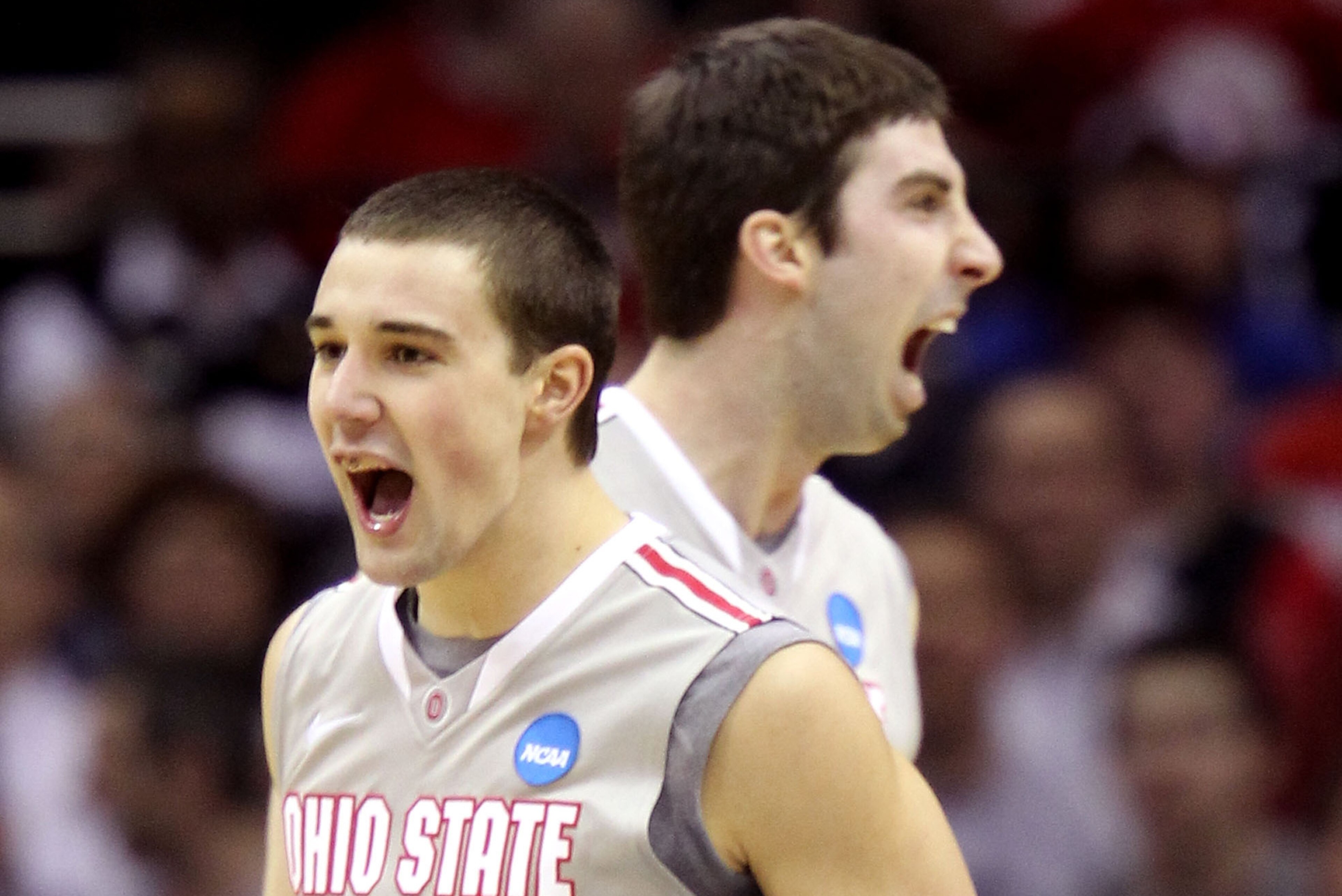 CLEVELAND, OH - MARCH 20: Aaron Craft #4 and Jon Diebler #33 of the Ohio State Buckeyes celebrate after a play in the first half against the George Mason Patriots during the third of the 2011 NCAA men's basketball tournament at Quicken Loans Arena on March 20, 2011 in Cleveland, Ohio.  (Photo by Andy Lyons/Getty Images)