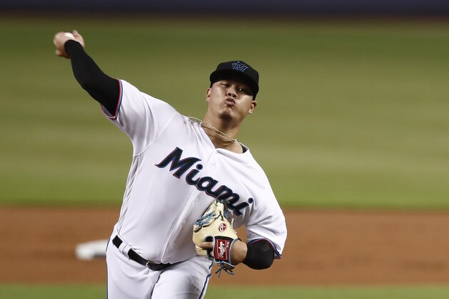 Miami Marlins starting pitcher Jordan Yamamoto (50) delivers during the first inning of a baseball game against the Minnesota Twins on Thursday, Aug. 1, 2019, in Miami. (AP Photo/Brynn Anderson)