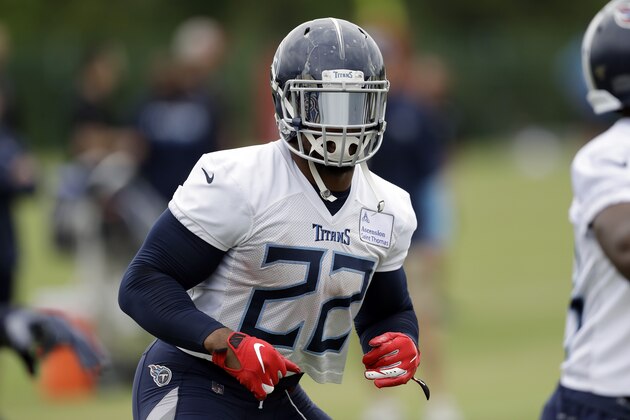 Tennessee Titans running back Derrick Henry (22) warms up during an organized team activity at the Titans' NFL football training facility Thursday, May 30, 2019, in Nashville, Tenn. (AP Photo/Mark Humphrey)