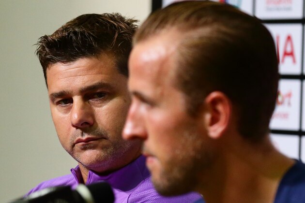 SINGAPORE - JULY 19:  Manager of Tottenham Hotspur, Mauricio Pochettino looks on as Harry Kane speaks at the press conference during the Tottenham Hotspur official training/press conference at the Singapore National Stadium on July 19, 2019 in Singapore.  (Photo by Suhaimi Abdullah/International Champions Cup/Getty Images)