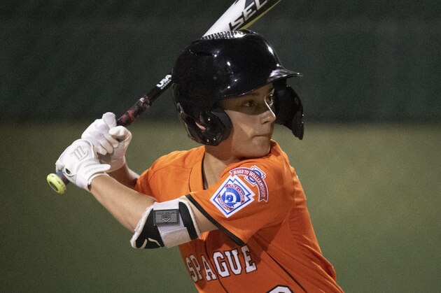 Oregon's Andrew Mhoon during a Little League regional tournament baseball game, Monday, Aug. 5, 2019, in San Bernardino, Calif. (AP Photo/Kyusung Gong)