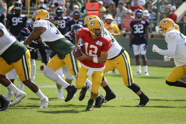 Green Bay Packers quarterback Aaron Rodgers (12) during a joint NFL football practice with the Houston Texans Monday, Aug 5, 2019, in Green Bay, Wis. (AP Photo/Mike Roemer)