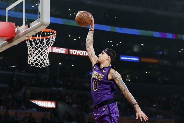 LOS ANGELES, CA - MARCH 29: Kyle Kuzma #0 of the Los Angeles Lakers dunks the ball against the Charlotte Hornets on March 29, 2019 at STAPLES Center in Los Angeles, California. NOTE TO USER: User expressly acknowledges and agrees that, by downloading and/or using this Photograph, user is consenting to the terms and conditions of the Getty Images License Agreement. Mandatory Copyright Notice: Copyright 2019 NBAE (Photo by Chris Elise/NBAE via Getty Images)