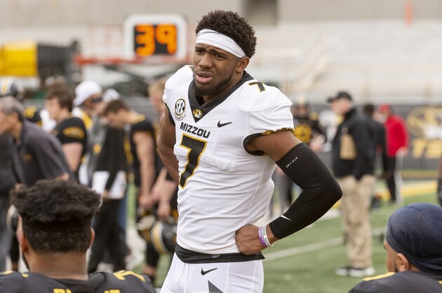 Missouri quarterback Kelly Bryant talks with teammates on the bench during an NCAA college football intra-squad spring game Saturday, April 13, 2019, in Columbia, Mo. (AP Photo/L.G. Patterson)