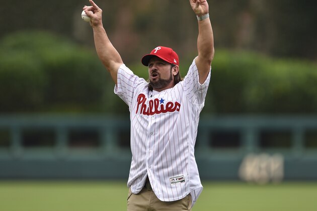 WWE superstar A.J. Styles throws out the ceremonial opening pitch prior to a baseball game between the Philadelphia Phillies and the Milwaukee Brewers, Sunday, July 23, 2017, in Philadelphia. (AP Photo/Derik Hamilton)