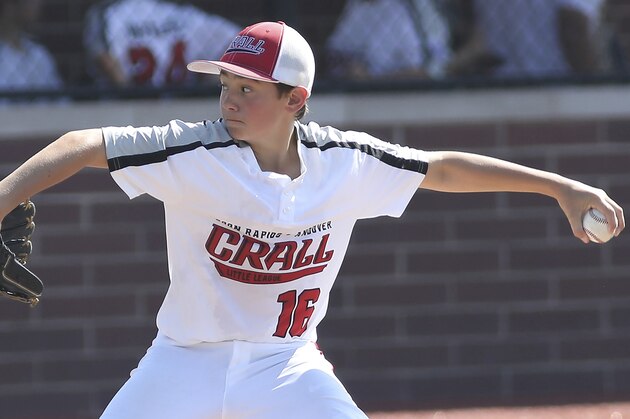 Minnesota's Carson Timm throws a pitch during a Little League regional tournament baseball game, Sunday, Aug. 4, 2019, in Westfield, Ind. (AP Photo/Tony Tribble)