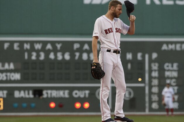 Boston Red Sox starting pitcher Chris Sale reacts on the mound in the first inning of a baseball game against the Los Angeles Angels at Fenway Park, Thursday, Aug. 8, 2019, in Boston. (AP Photo/Elise Amendola)