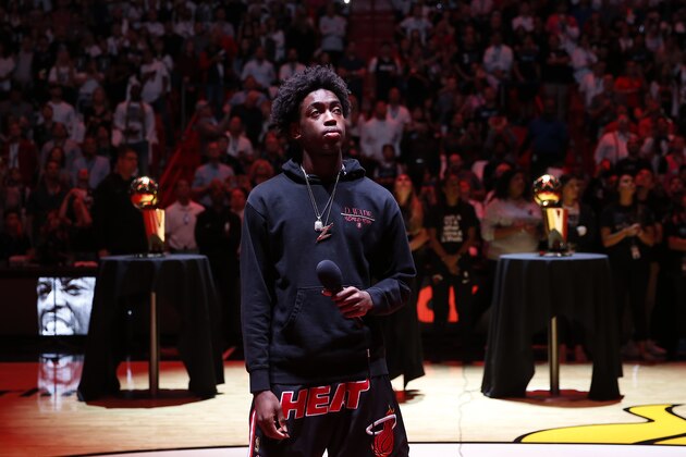MIAMI, FLORIDA - APRIL 09: Dwyane Wade #3 of the Miami Heat son, Zaire Wade, introduces his father prior to the game between the Philadelphia 76ers and the Miami Heat at American Airlines Arena on April 09, 2019 in Miami, Florida. NOTE TO USER: User expressly acknowledges and agrees that, by downloading and or using this photograph, User is consenting to the terms and conditions of the Getty Images License Agreement.  (Photo by Michael Reaves/Getty Images)