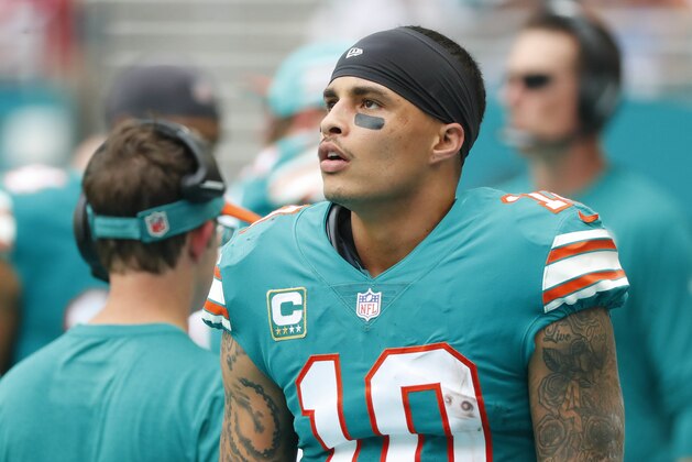 Miami Dolphins wide receiver Kenny Stills (10) stands on the sidelines, during the first half of an NFL football game against the New England Patriots, Sunday, Dec. 9, 2018, in Miami Gardens, Fla. (AP Photo/Wilfredo Lee)