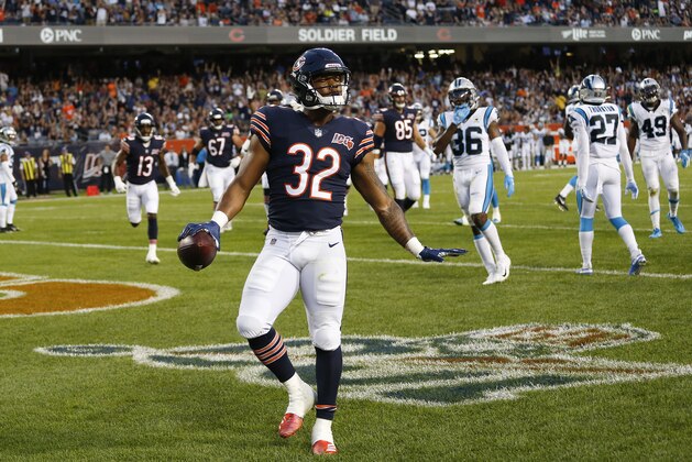 CHICAGO, ILLINOIS - AUGUST 08: David Montgomery #32 of the Chicago Bears reacts after scoring a touchdown against the Carolina Panthers during a preseason game at Soldier Field on August 08, 2019 in Chicago, Illinois. (Photo by Nuccio DiNuzzo/Getty Images)
